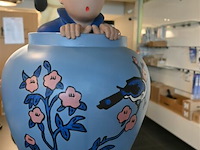 Beeld van kuifje in "de blauwe lotus" - afbeelding 1 van  5