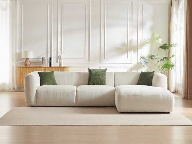 Beige stof bank in de rechterhoek - afbeelding 8 van  9