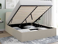 Beige stoffen borstbed met bedvoet en afgerond hoofdeinde 140x190cm