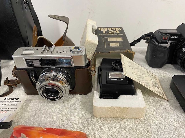 Bekijk beschrijving vintage camera's & cameraset – chinon, minolta, canon + accessoires - afbeelding 10 van  13