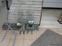 Bloemhouders in ijzer