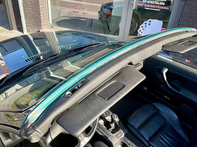 Bmw e36 320i cabrio (hardtop) - lage km en nette staat - afbeelding 29 van  38