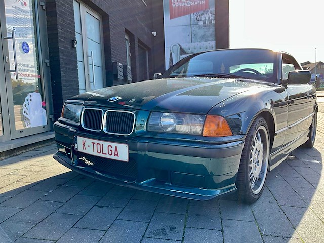 Bmw e36 320i cabrio (hardtop) - lage km en nette staat - afbeelding 36 van  38