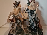 Brocante: koppel in hars - afbeelding 1 van  3