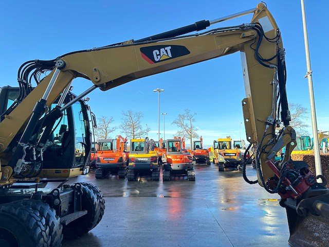 Caterpillar - 2014 - m313d - banden graafmachine - afbeelding 11 van  64