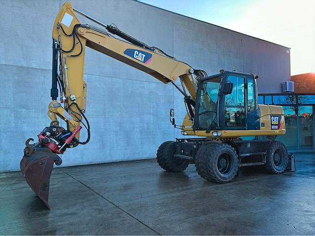 Caterpillar - 2014 - m313d - banden graafmachine - afbeelding 1 van  64