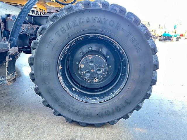 Caterpillar - 2014 - m313d - banden graafmachine - afbeelding 16 van  64