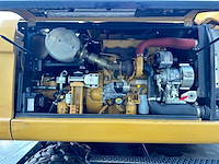 Caterpillar - 2014 - m313d - banden graafmachine - afbeelding 36 van  64