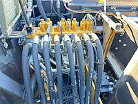 Caterpillar - 2014 - m313d - banden graafmachine - afbeelding 41 van  64