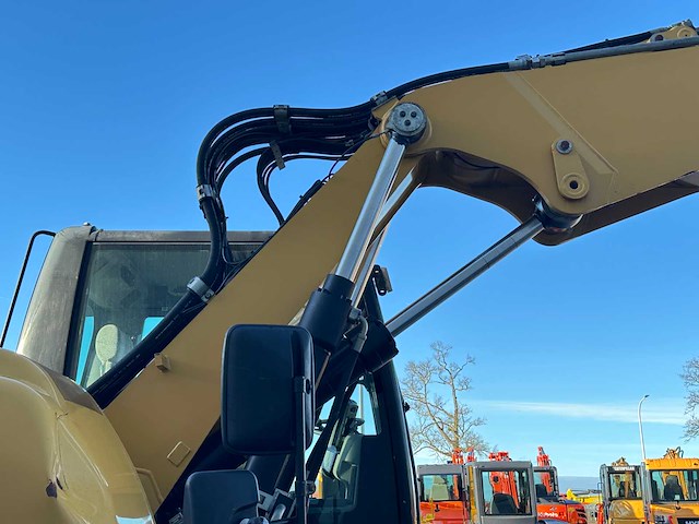 Caterpillar - 2014 - m313d - banden graafmachine - afbeelding 58 van  64