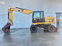 Caterpillar - 2014 - m313d - banden graafmachine - afbeelding 62 van  64