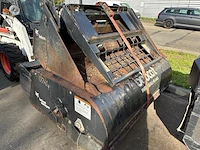 Compactlader met bak, veegmachine en vorken, bobcat 773, bouwjaar 1999, serienummer 509617404, 33 kw, 2.700 kg, wielaandrijving - afbeelding 7 van  8