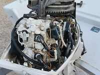 Consoleboot ace cruiser composiet van 1982, lengte 4,8m, 6 personen, 75pk 2-takt langstaart buitenmotor van 1989 van het merk mercury. de motor draait en koelt goed. onderhoud is aangewezen. benzineleidingen zijn verduurd waardoor ze lekken - afbeelding 8 van  35