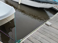 Consoleboot ace cruiser composiet van 1982, lengte 4,8m, 6 personen, 75pk 2-takt langstaart buitenmotor van 1989 van het merk mercury. de motor draait en koelt goed. onderhoud is aangewezen. benzineleidingen zijn verduurd waardoor ze lekken - afbeelding 20 van  35