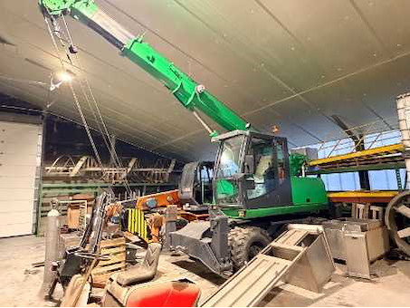 Constructiekraan, veegmachines en magazijninventaris