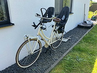 Cortina u4 ttansport met thule kinderzitjes damesfiets
