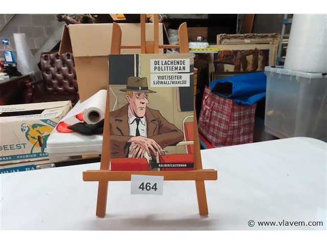 De lachende politieman - afbeelding 1 van  2