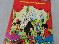 De zingende oorbellen - afbeelding 1 van  3