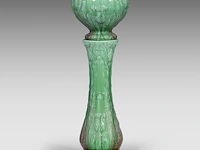Delphin massier (1836-1907), green glazed ceramic jardinière on stand decorated with thistles 113 cm. (44.49 in.)