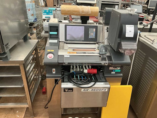Digi aw-4600fx automatische weeg-inpak en etikettering systeem - afbeelding 1 van  5