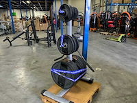 Diversen 50mm schijven 125kg met rek krachtstation - afbeelding 1 van  7