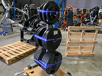 Diversen 50mm schijven 250kg met rek krachtstation - afbeelding 1 van  7