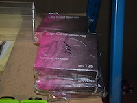 Doosje met ca. 80 stuks piercings en stretchers, ca. 36 metalen verstelbare tatoeage handvaten, elektrische tatoeage machine goud rotary, 2 spoel tatoeage machines,10 wergwerp cartridges grip zwart, 2 paarse bischop rotary tatoeage machines, - afbeelding 5 van  33