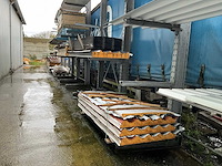 Draagarmstelling met inhoud grote partij isolatiepanelen - afbeelding 4 van  9