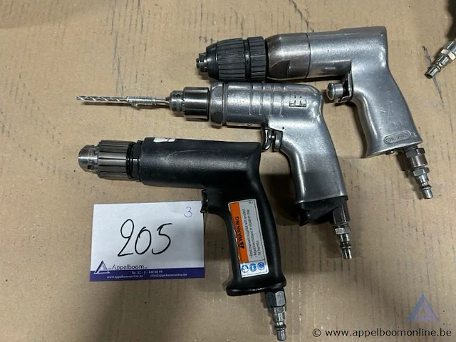 Drie pneumatische boormachines. - afbeelding 1 van  2