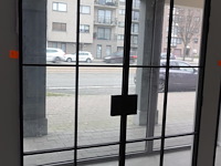 Dubbele smeedwerken deur