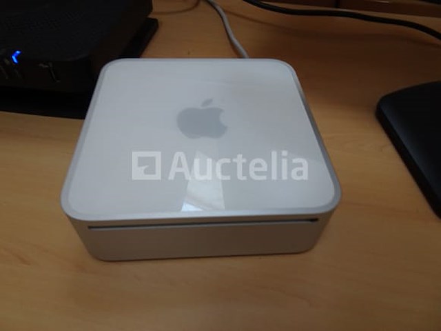 Een apple mac mini computer en een dell-scherm - afbeelding 1 van  2