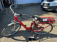 Elektrische fiets shimano, met sleutel, nummer 702-261, met latder, werking niet gekend