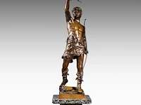 Eugène marioton (1854-1933), 'vainqueur' (1895), patinated bronze on a marble column the bronze: 74 cm. (29.12 in.), with marble column: 199 cm. (78.34 in.)