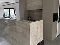 Exclusieve designkeuken met fenix-fronten, dekton werkblad en novy-apparatuur - afbeelding 1 van  3