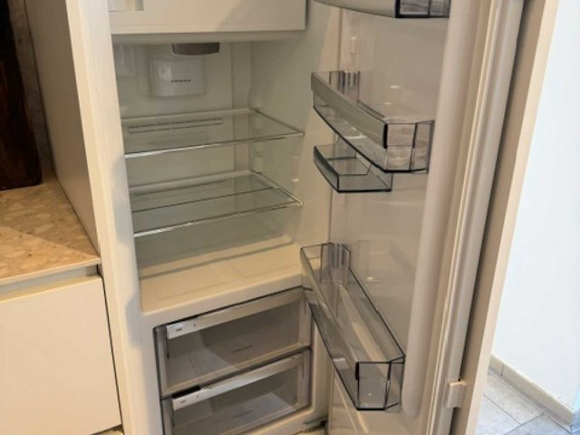 Exclusieve designkeuken met neolith keramisch werkblad, kookeiland en aeg-inbouwtoestellen - afbeelding 8 van  20