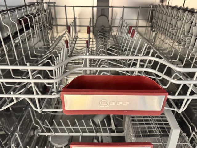 Exclusieve showroomkeuken met luxe keramisch monobloc-eiland, hoogwaardige neff-toestellen en novy dampkap - afbeelding 16 van  23