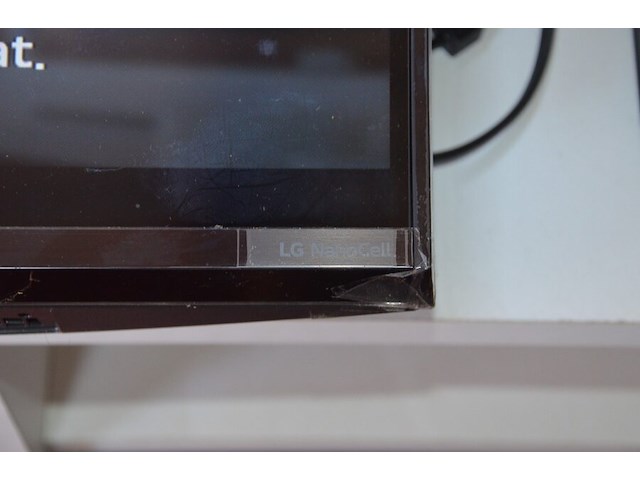 Flatscreen tv lg 50nano2t6b met afstandsbediening en muurbeugel, fineer bureel met 1 lade en 1 deur, soundbar medion, bureau stoel - afbeelding 11 van  14