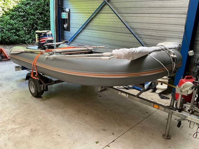 Foldable rib frib360 rubberboot met evinrude 35 pk, minn kota elektromotor en trailer - afbeelding 7 van  20