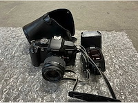 Fototoestellen met accessoires en natuurfoto's wegens faillissement angle agency