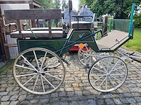 Geveerde paardenkoets