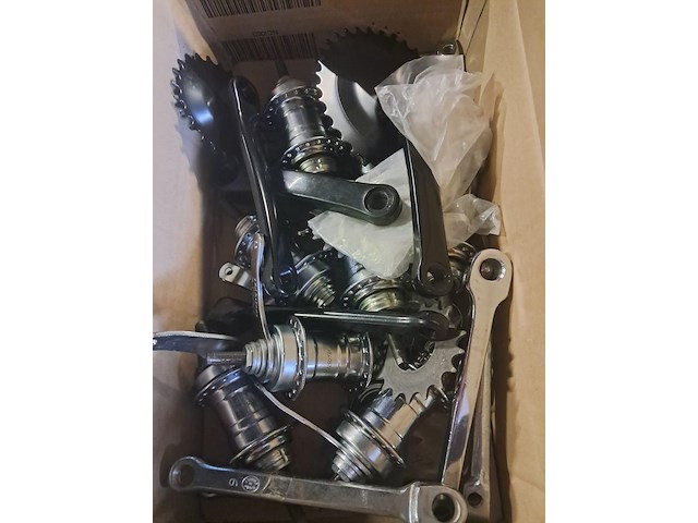Groot lot fietsonderdelen met 2 vorken,bellen,stuurpennen,torpedo's,crankstellen,remhendels en manivillen - afbeelding 5 van  6