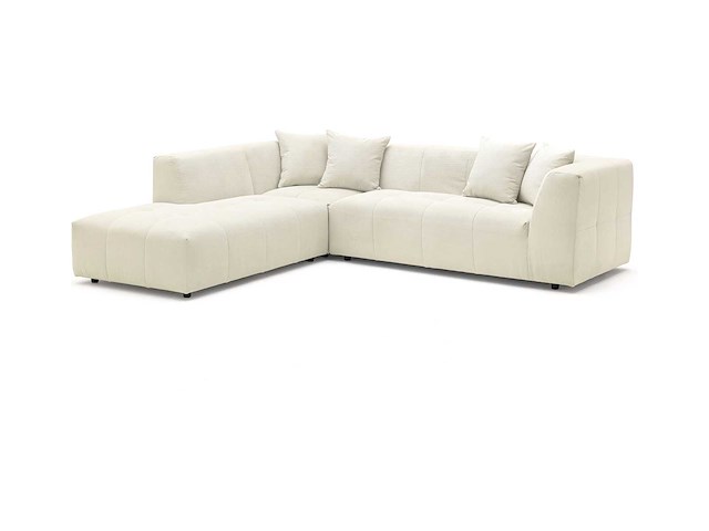 Grote beige fijn geribbelde ribfluweel bank in de linkerhoek van maison céphy - afbeelding 6 van  11