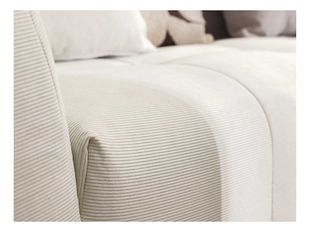 Grote beige fijn geribbelde ribfluweel bank in de linkerhoek van maison céphy - afbeelding 7 van  11