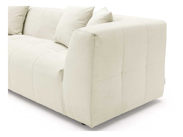 Grote beige fijn geribbelde ribfluweel bank in de linkerhoek van maison céphy - afbeelding 8 van  11