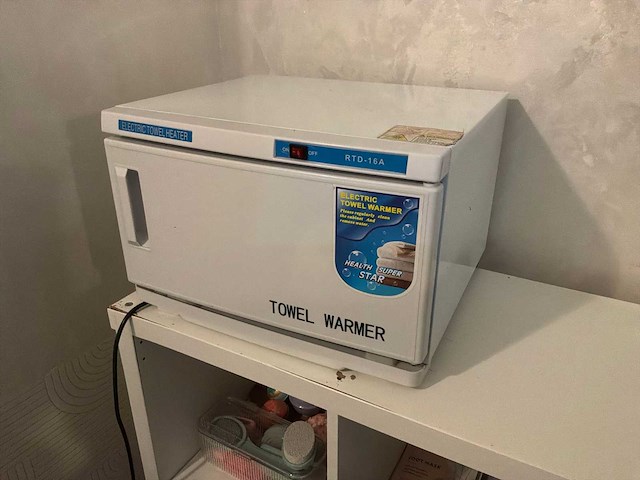 Handdoekontsmetter - afbeelding 1 van  8