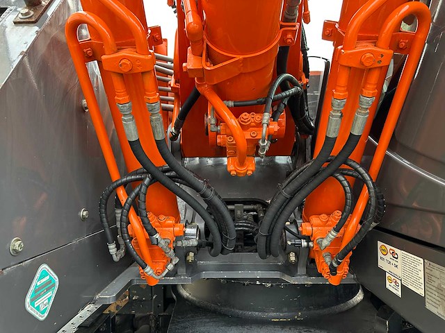 Hitachi - 2012 - zx145w-3 - banden graafmachine - afbeelding 11 van  47