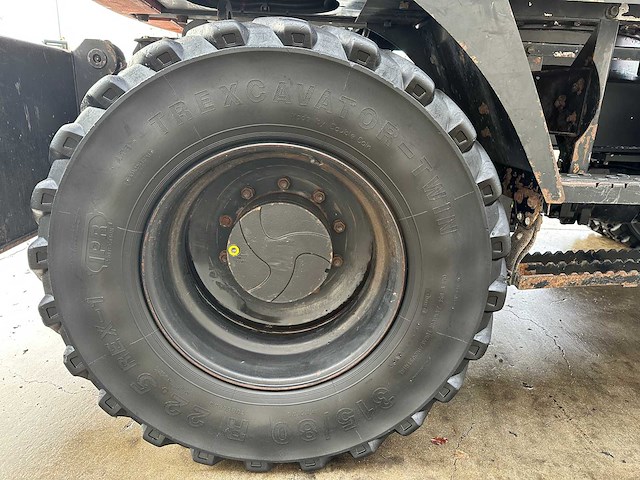 Hitachi - 2012 - zx145w-3 - banden graafmachine - afbeelding 19 van  47