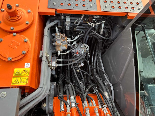 Hitachi - 2012 - zx145w-3 - banden graafmachine - afbeelding 21 van  47