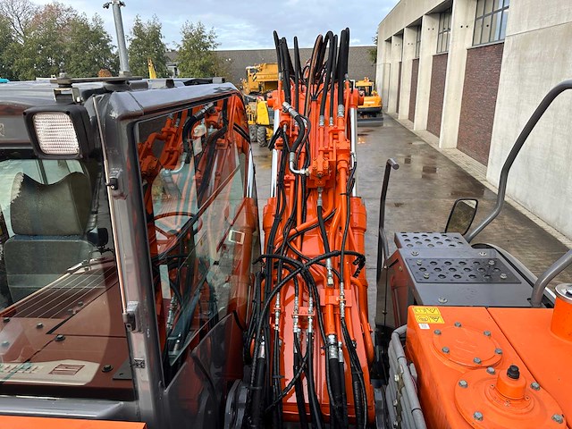 Hitachi - 2012 - zx145w-3 - banden graafmachine - afbeelding 22 van  47