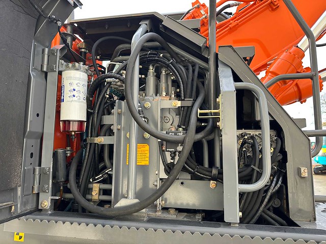 Hitachi - 2012 - zx145w-3 - banden graafmachine - afbeelding 33 van  47